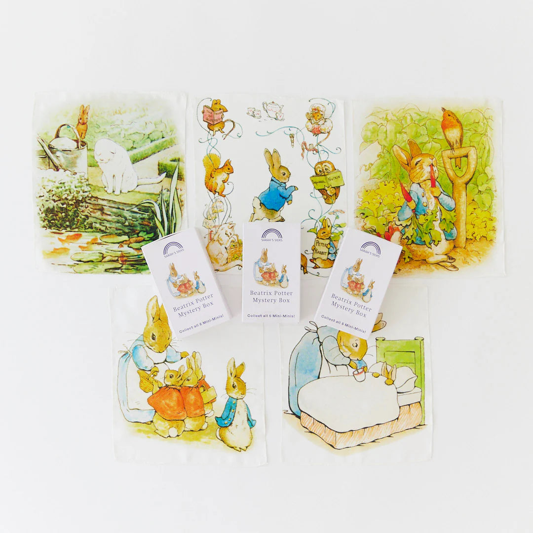 Sarah's Silks Beatrix Potter Mystery boxes of min playsilks with Peter Rabbit scenes