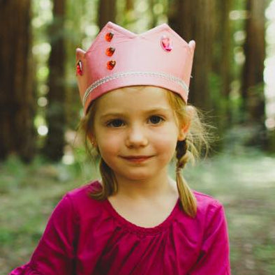 girl wearing sarah's silks pink princess crown with red jewels