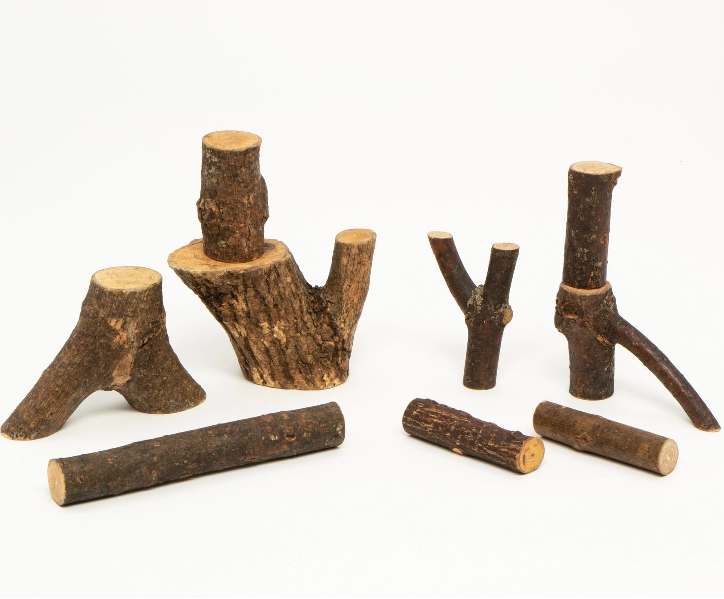 A set of natural wooden giant tree branch toys. 