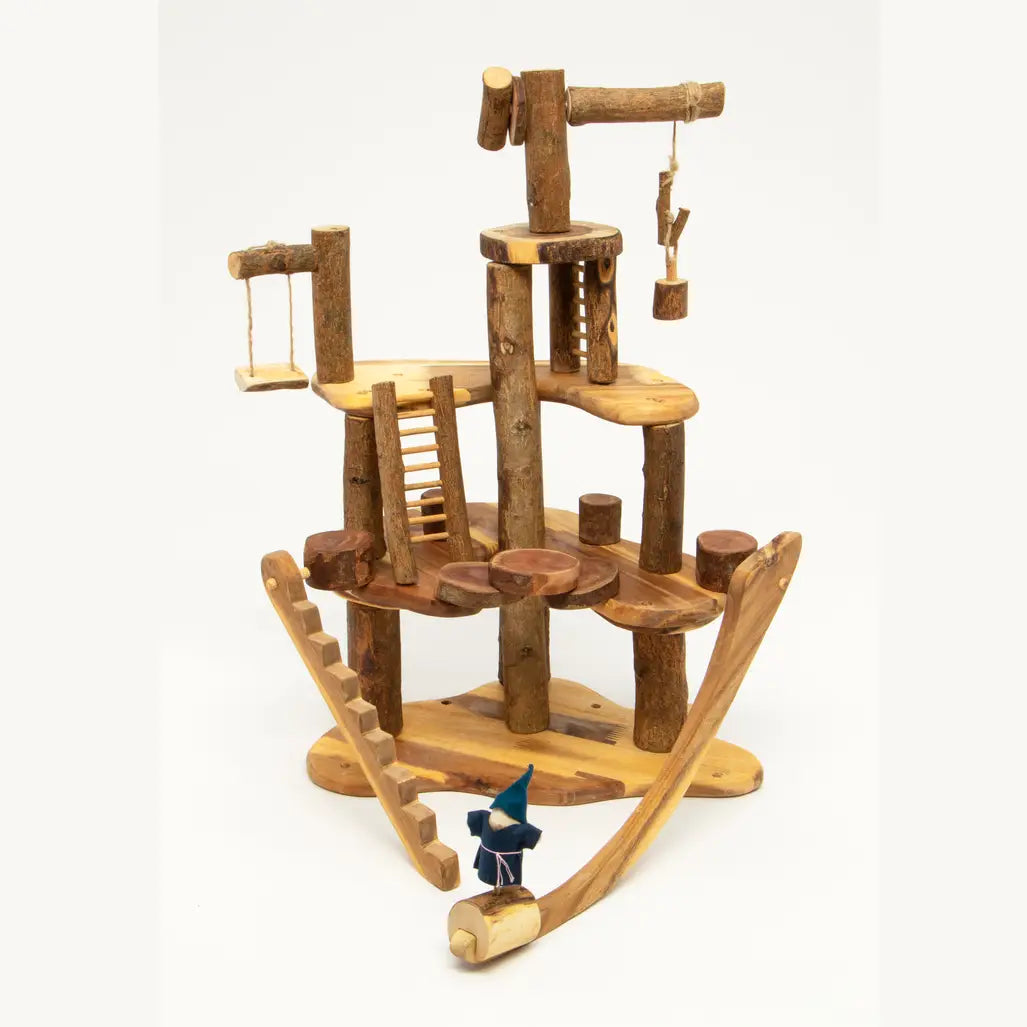 Tree Blocks Wooden Cottage Treehouse toy set with three levels, a swing, a slide and a gnome