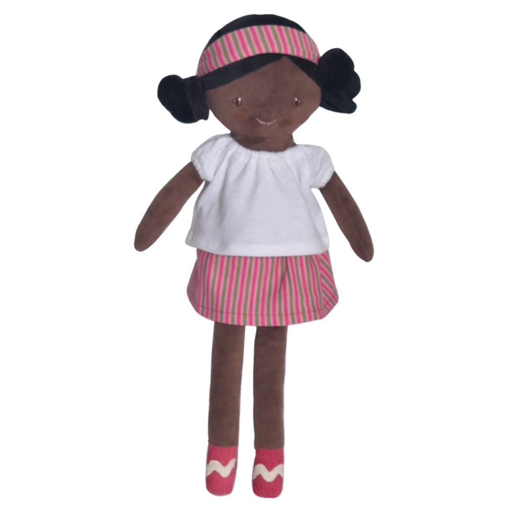 handmade black rag doll wearing striped skirt and headband