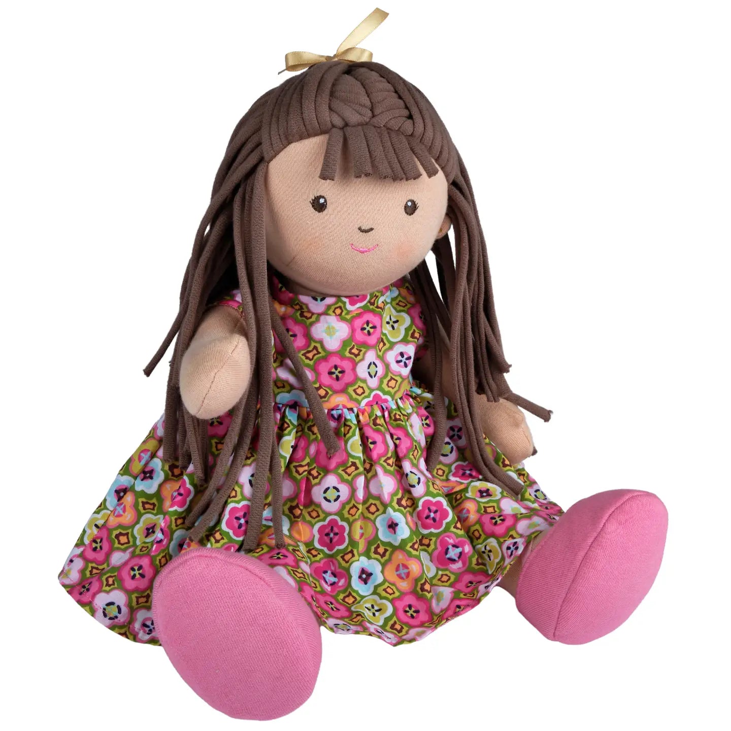 Plush jointed doll with long brown hair and a floral dress 