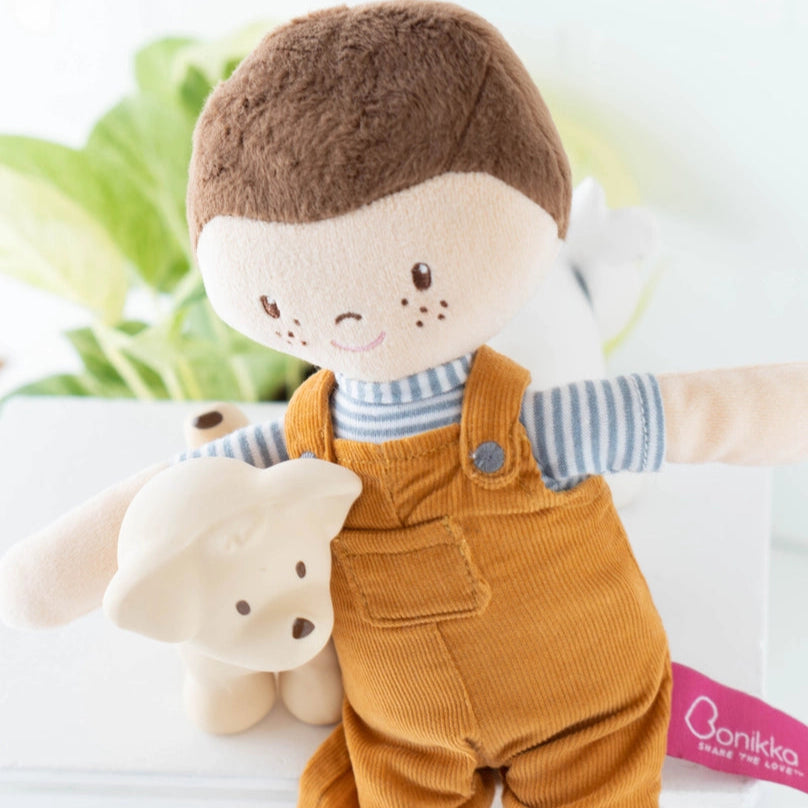 close up of Bonikka handmade boy rag doll in dungarees