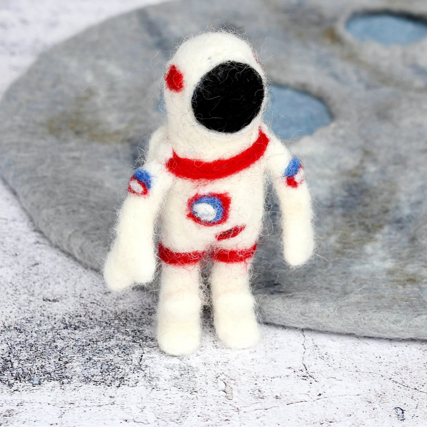Tara Treasures felted small world astronaut figure