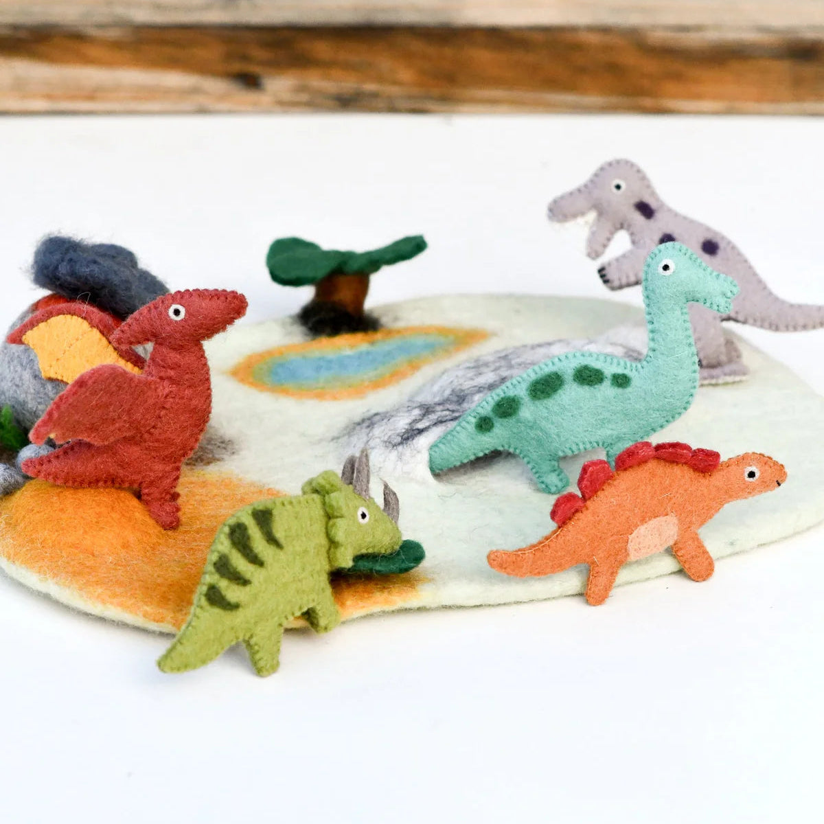 tara treasures felt dinosaur finger puppets including Pteranodon, brachiosaurus, triceratops and stegosaurus