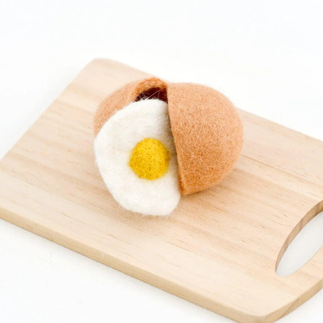 Tara Treasures felt play food eggshell with egg on a wooden cutting 