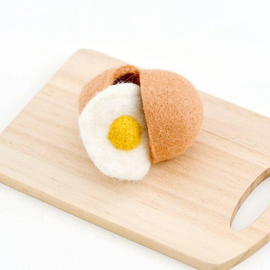 Tara Treasures felt play food eggshell with egg on a wooden cutting 