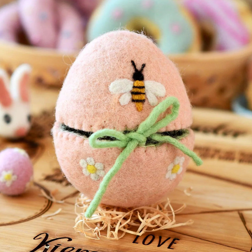 Felt Decorative pink egg with a bee design for a child's Easter basket gift. 