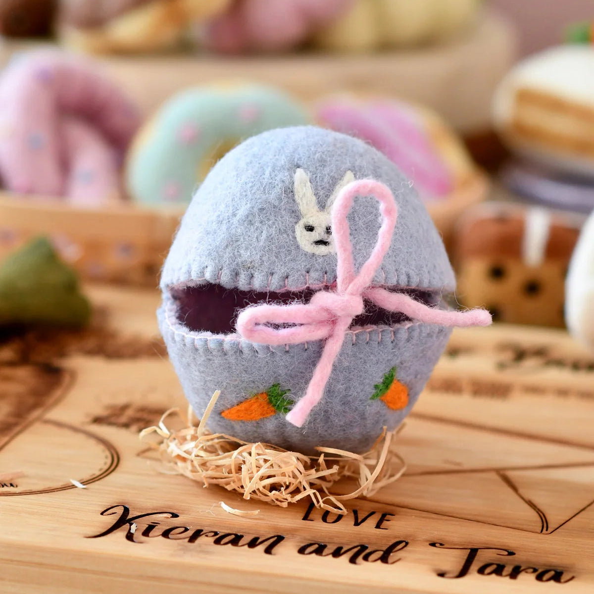 Decorative felt Easter egg gift for kids  with a bunny and carrots 