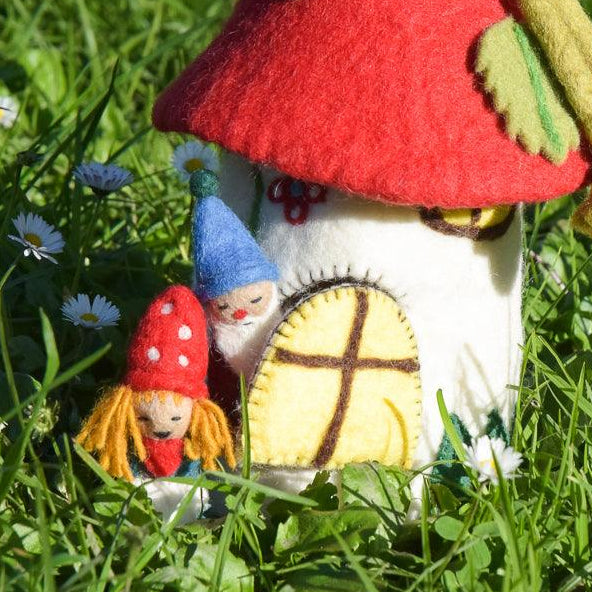 Felted gnome and fairy finger puppet with a fairy house