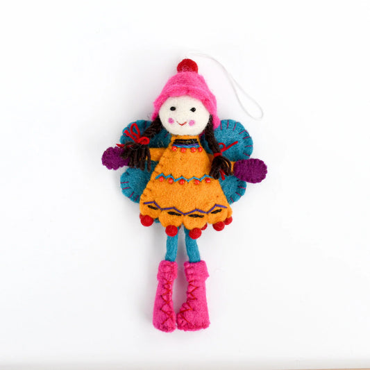 Colorful felted fairy doll with a pink hat and orange dress and blue wings