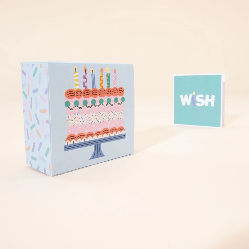 Box of Uncle Goose wooden toy birthday books with a Greeting card 
