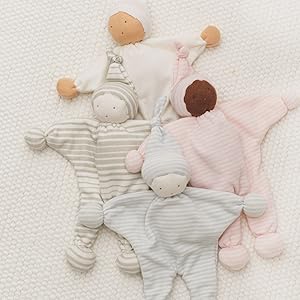 Under the Nile Organic Baby Buddy Dolls with Light and Brown skin wearing solids and stripes