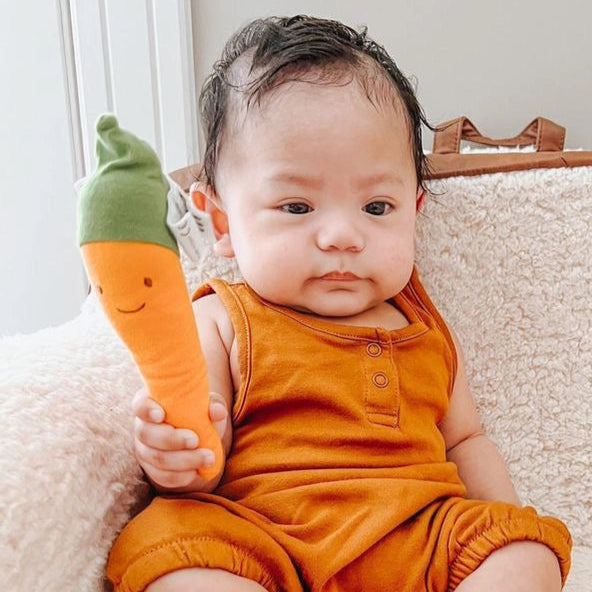 baby with under the nile organic teething toy