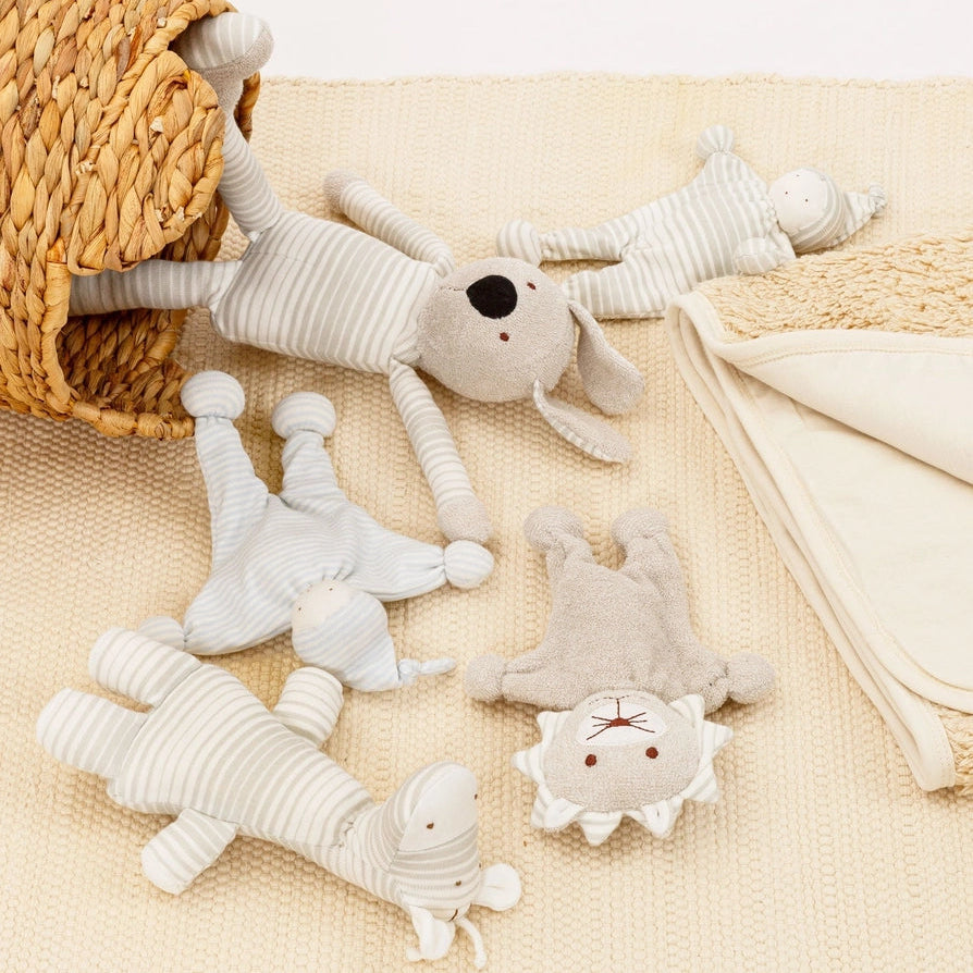 Soft organic stuffed animal baby toys with a woven basket basket.