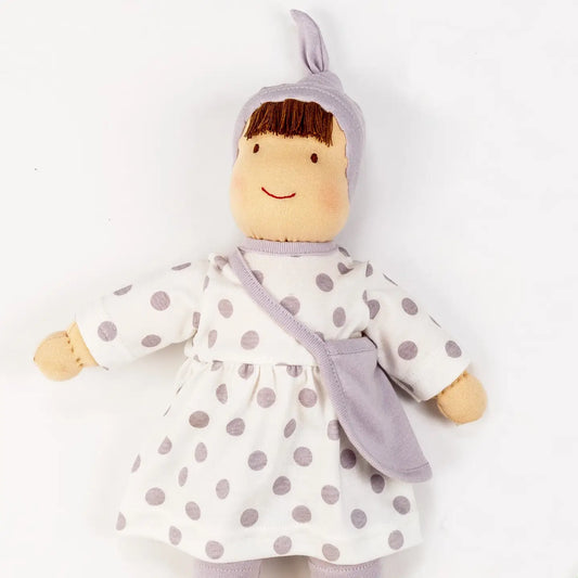 under the nile organic waldorf doll in purple dots with a change of clothes in a bag