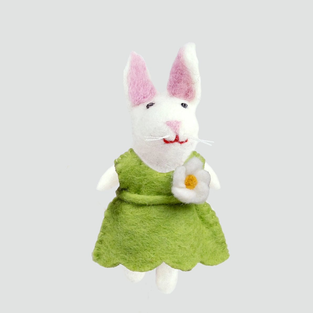 Felted girl bunny rabbit wearing a green dress with a white flower 