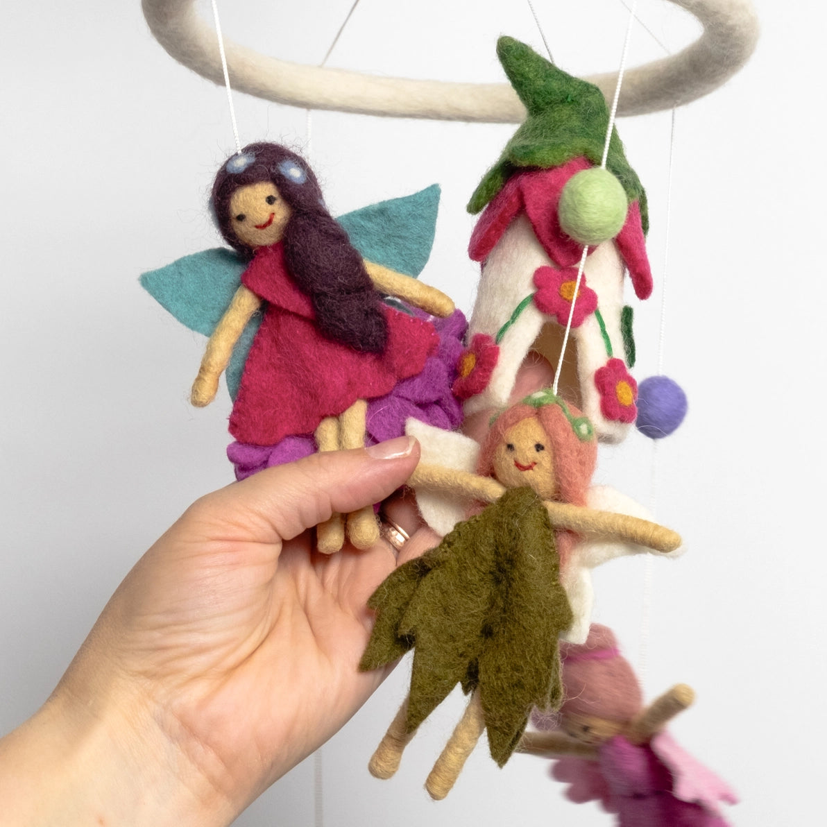 Felt fairy dolls and house baby mobile