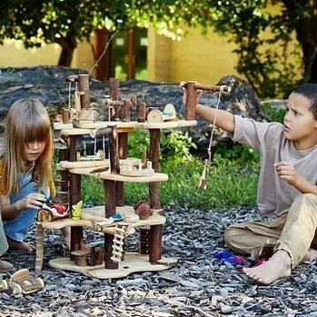 kids playing with a treehouse