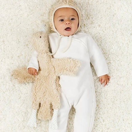 Baby with organic goose stuffed animal