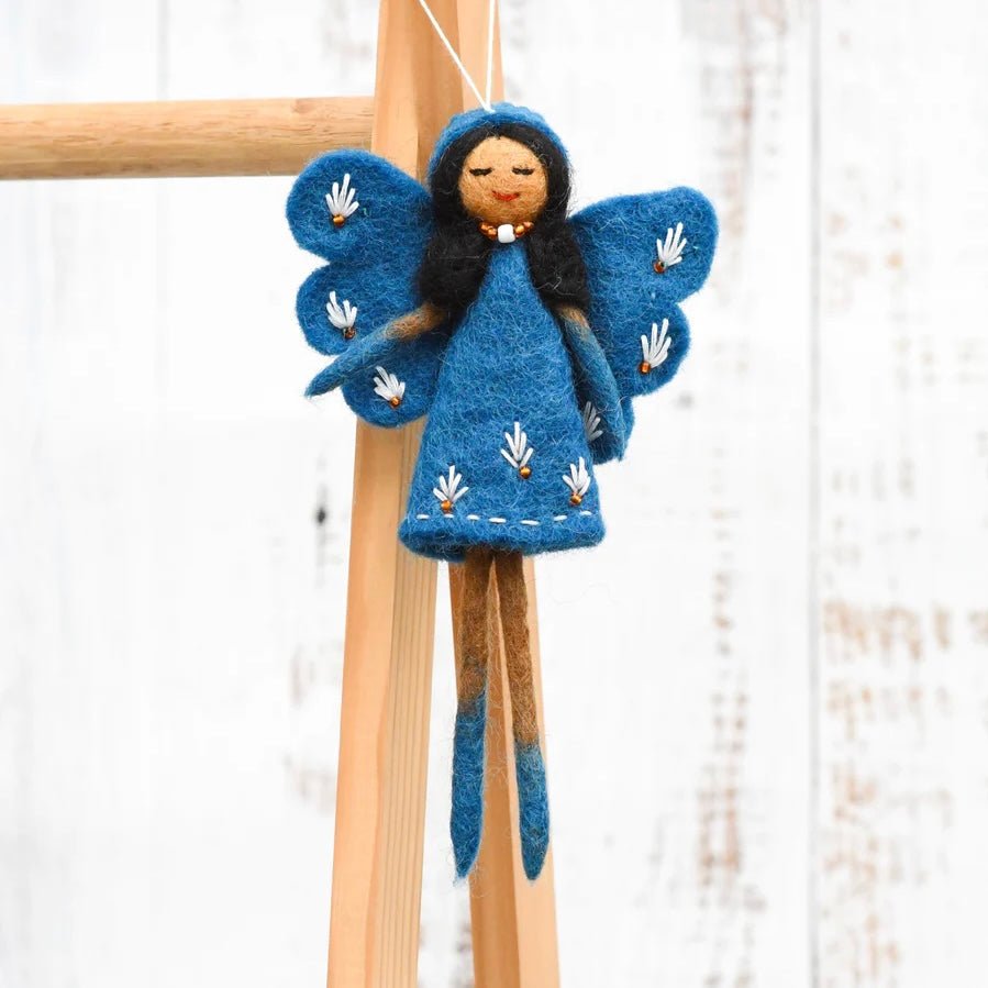 waldorf fairy blue dress hanging